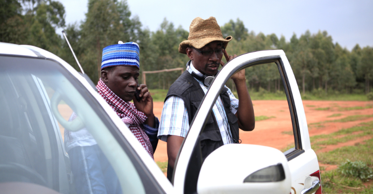 Actor Gambo Usman Kona rehearses a scene with the director on the set of The Milkmaid in the Mambilla Plateau, Taraba State, Nigeria.