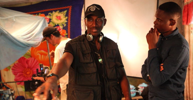 Director Desmond Ovbiagele with cinematographer Yinka Edward on the set of The Milkmaid in Jalingo, Taraba State, Nigeria.